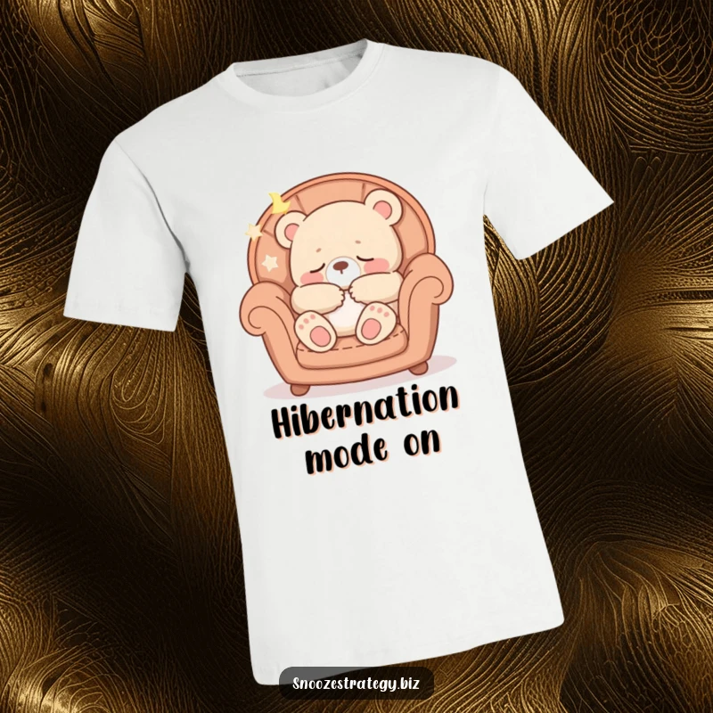 Funny t-shirt with a peaceful bear cub character snoozing comfortably in a plush armchair, radiating pure relaxation.