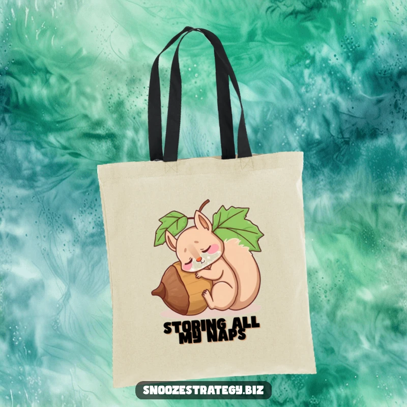 Funny tote bag with a drowsy squirrel character asleep against a giant acorn, symbolizing a love for naps and nature.